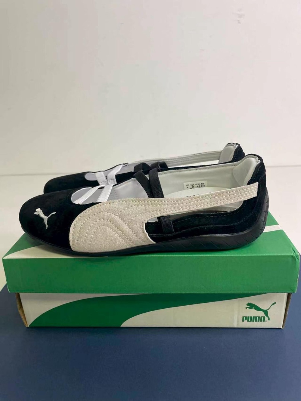 Puma Black and White Slip-On Ballet Flats
